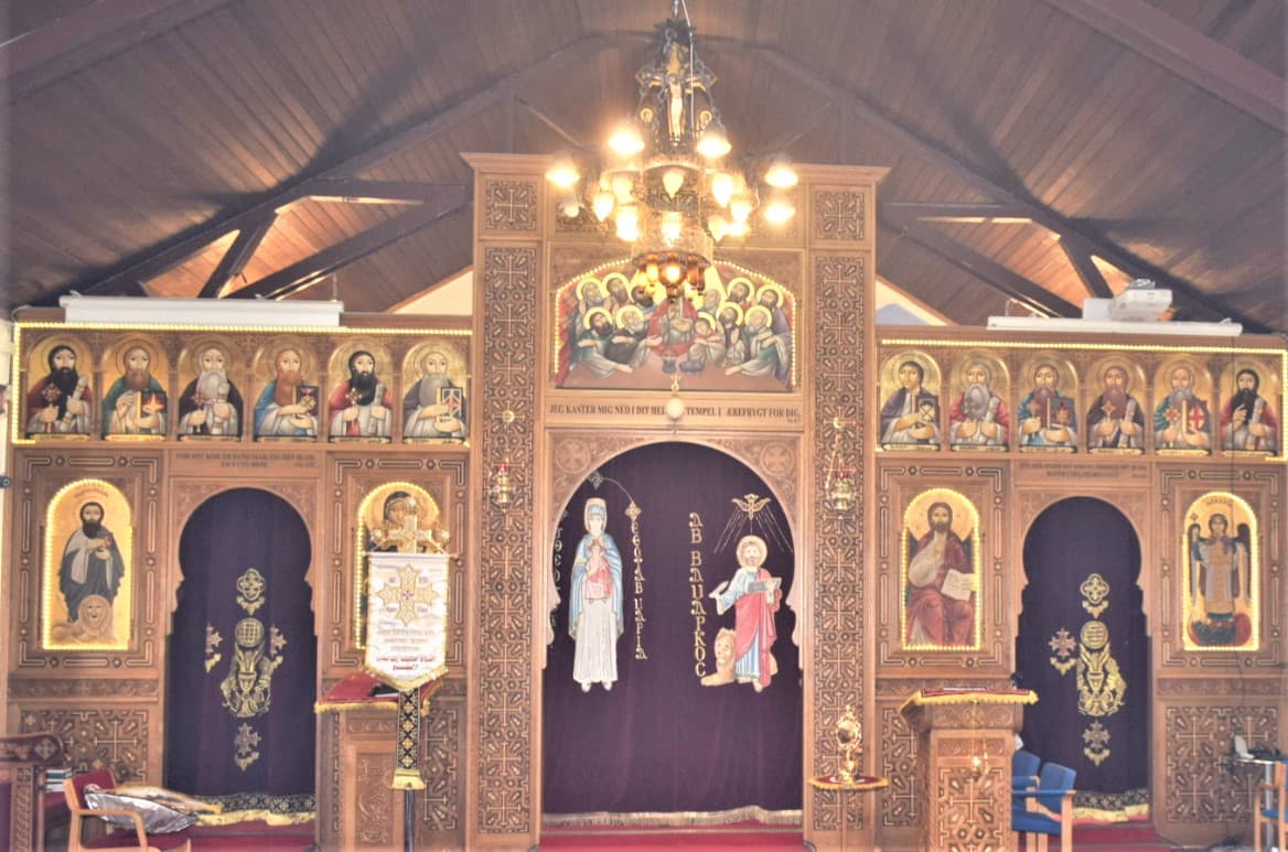 Church interior showing the ornate iconostasis